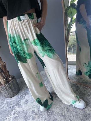Pantalone stampa fiori con banda laterale verde