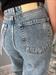 Jeans modello parigi dritto con tagli lavaggio denim