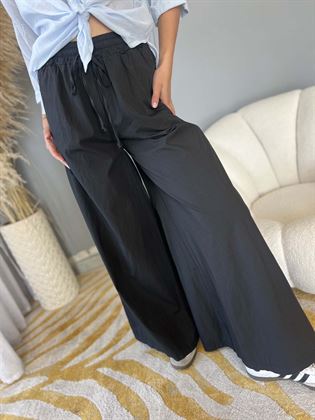 Pantalone palazzo nero in cotone con elastico in vita