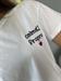  T-Shirt bianca girocollo ricamo calmati proprio