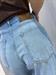 Jeans chiaro tela leggera modello wide leg