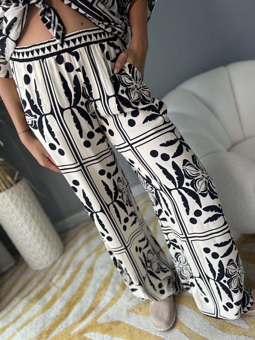 pantalone fantasia palmette  panna e nero
