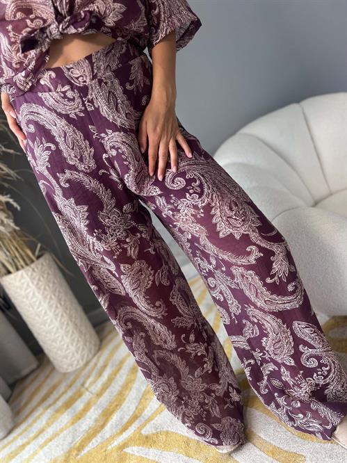 Pantalone palazzo burgundy fantasia con elastico dietro in mussola