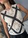 Top macrame panna e nero smanicato