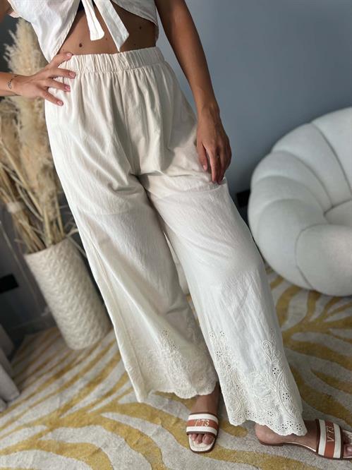 pantalone lungo burro con ricamo infondo