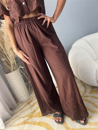 pantalone marrone con ricami infondo ed elastico in vita