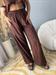 pantalone marrone con ricami infondo ed elastico in vita