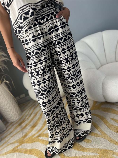 Pantalone dritto morbido fantasia panna e nero con elastico in vita