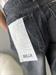 jeans nero modello bella con strappi infondo
