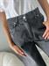 jeans nero modello bella con strappi infondo