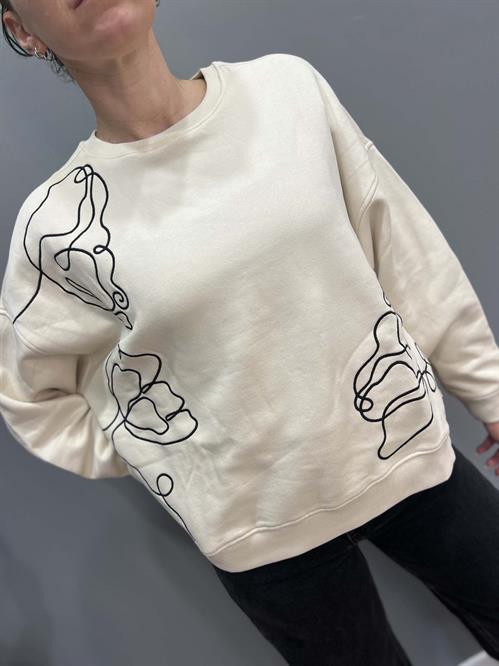 Felpa panna girocollo over con ricami in  nero in cotone