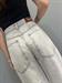 Jeans modello giusy grigio chiaro con applicazioni strass