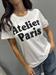  T-Shirt bianca scritta atelier paris