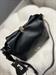 Borsa nera secchiello chiusura chiave lucchetto