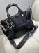 Borsa a mano con tracolla nera e borsetta gadget