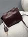 Borsa secchiello tracolla burgundy  con chiusura a chiave