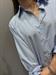 Camicia a righe azzurra e bianca in cotone