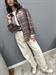 Camicia check quadri rosa e grigia con spilla