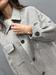 Cappotto grigio bottonato con tasche a toppa lana
