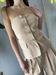 Top bottoni beige